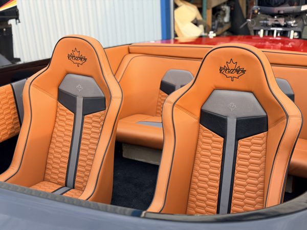 Tan and black marine bucket seats