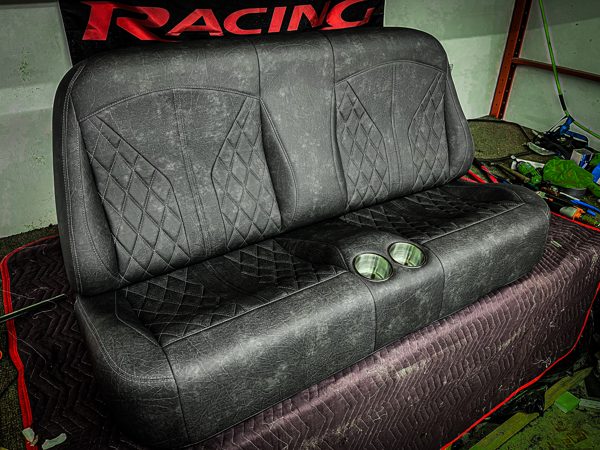 Patterned black upholstered bench